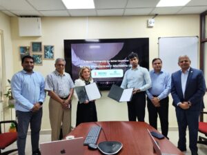 Our CEO, Marianne Ismail, with a signed strategic partnership agreement